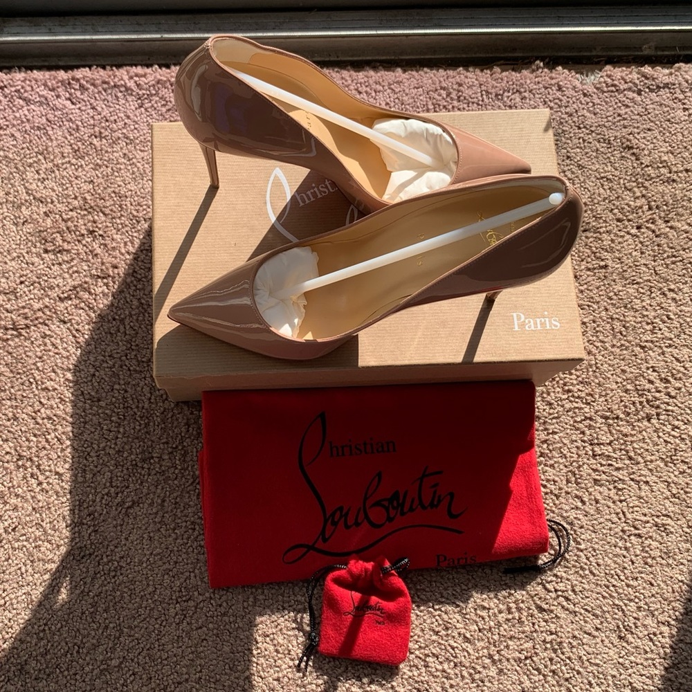 Brand new Christian Louboutin (RED BOTTOMS)